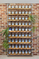 Large kitchen shelf kilner mason jar pantry shelving industrial style on brick wall background