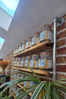 Top view kitchen shelf kilner mason jar pantry shelving industrial style on brick wall background